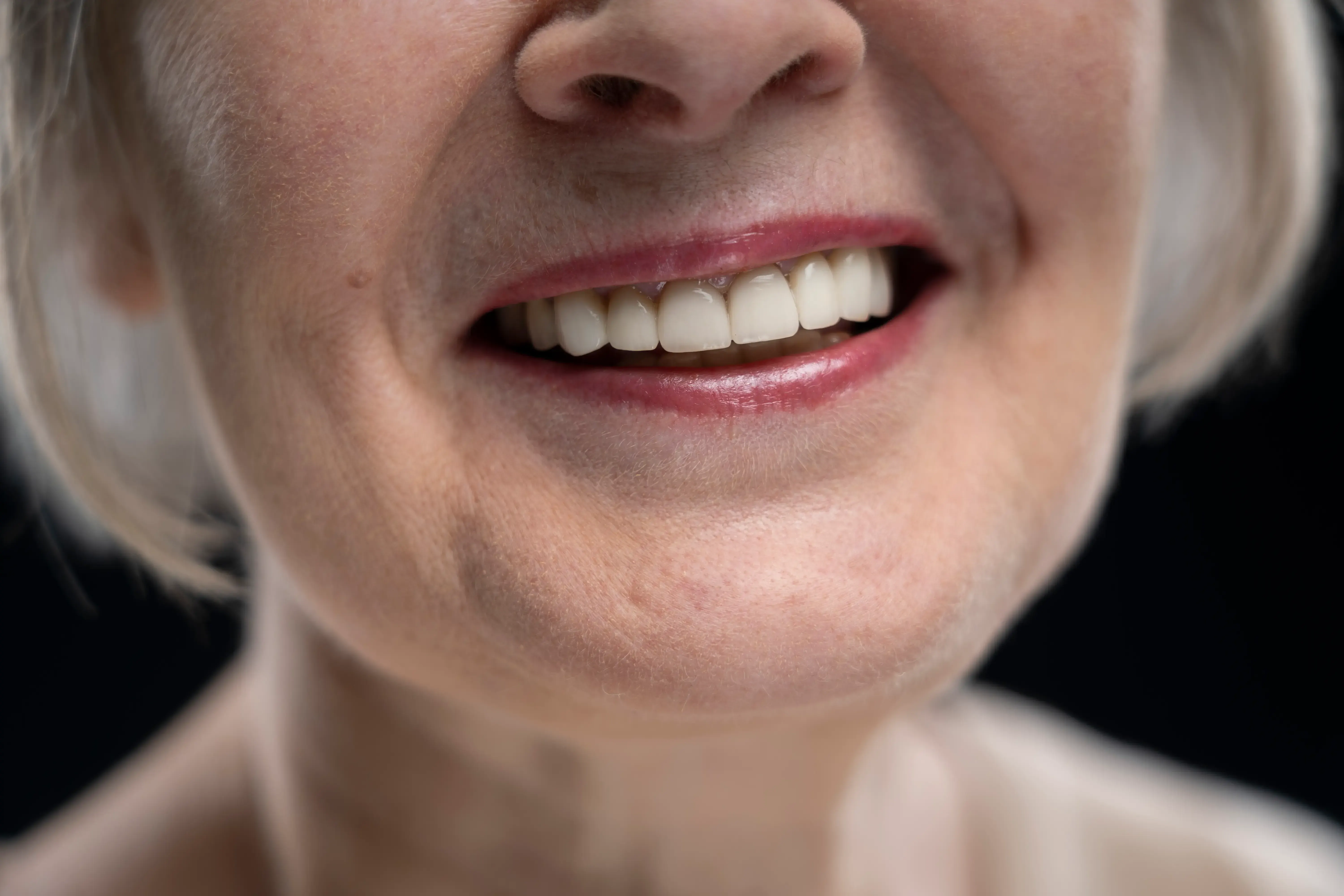 Confident patient portrait after dentures fitting at East Ellijay Dental in East Ellijay, GA