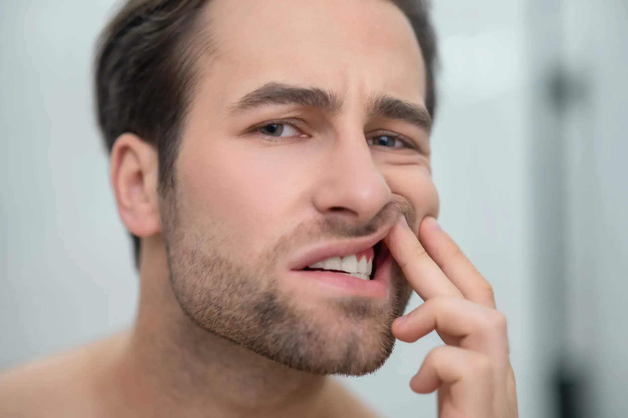 Patient noticing bleeding gums while brushing at home near East Ellijay Family & Cosmetic Dentistry