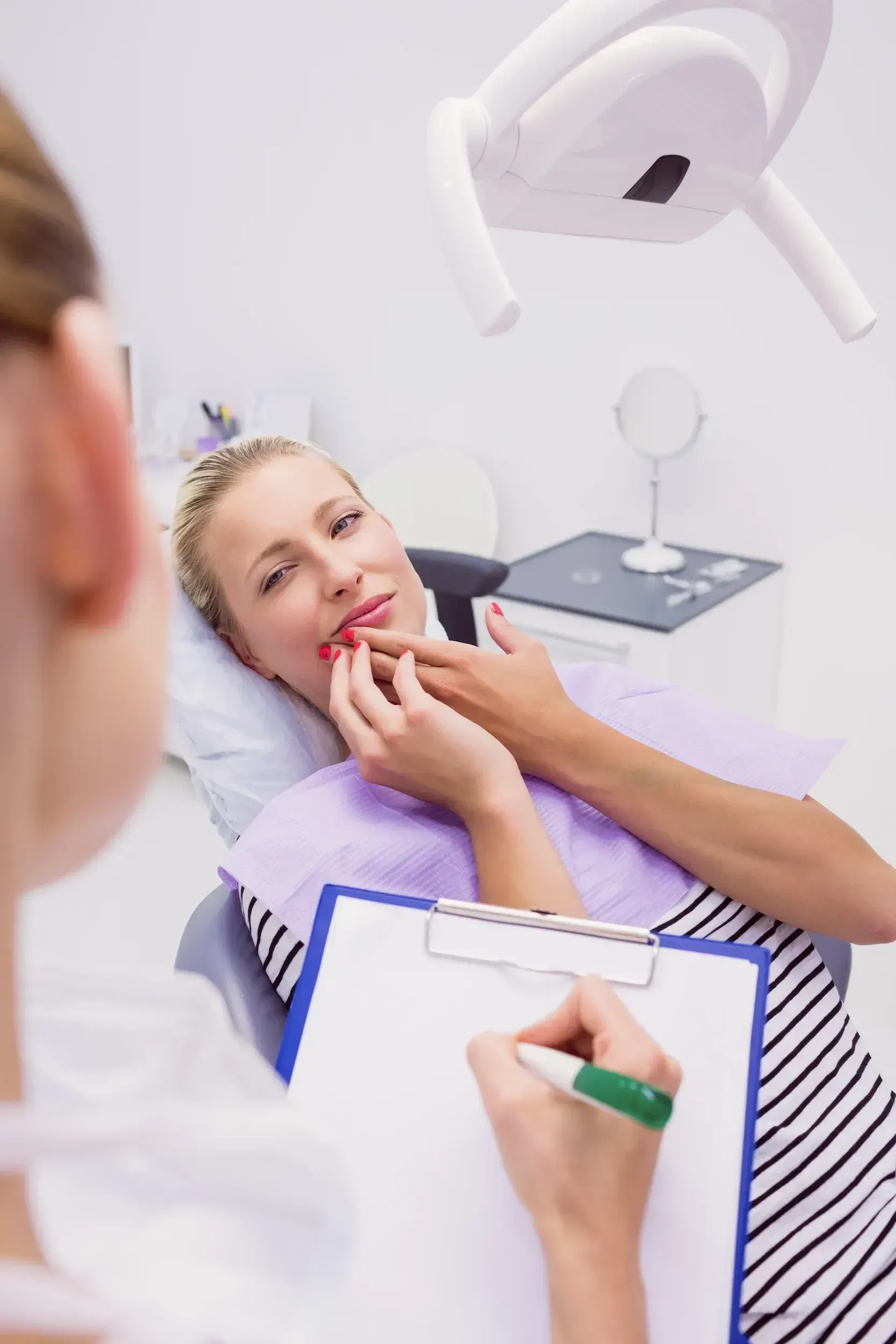 Confident patient after tooth extractions at East Ellijay Dental in East Ellijay GA