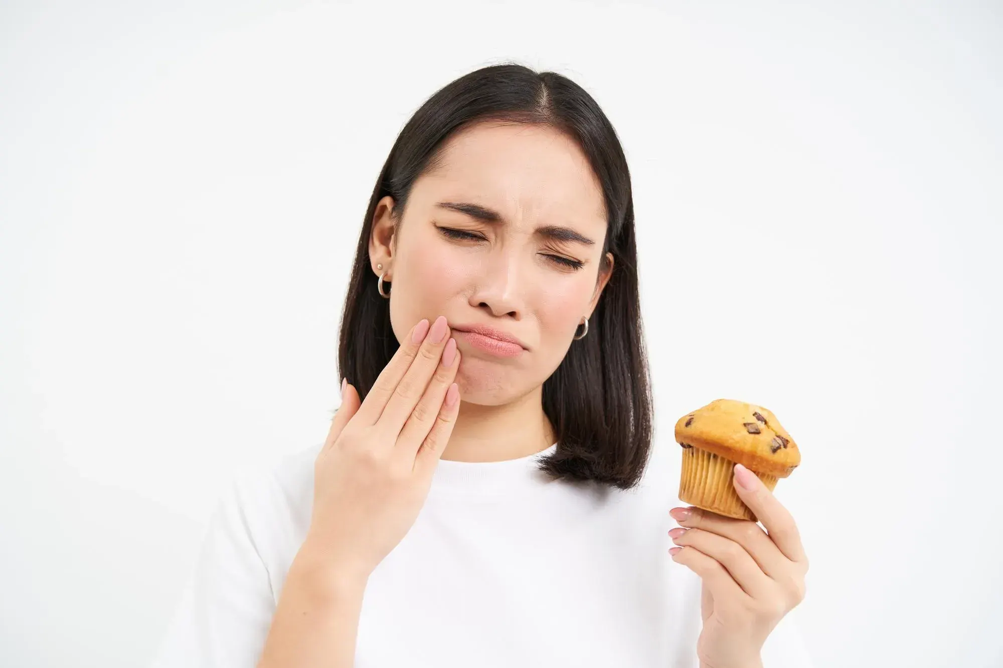 Close-up of patient demonstrating tooth sensitivity at East Ellijay Family & Cosmetic Dentistry