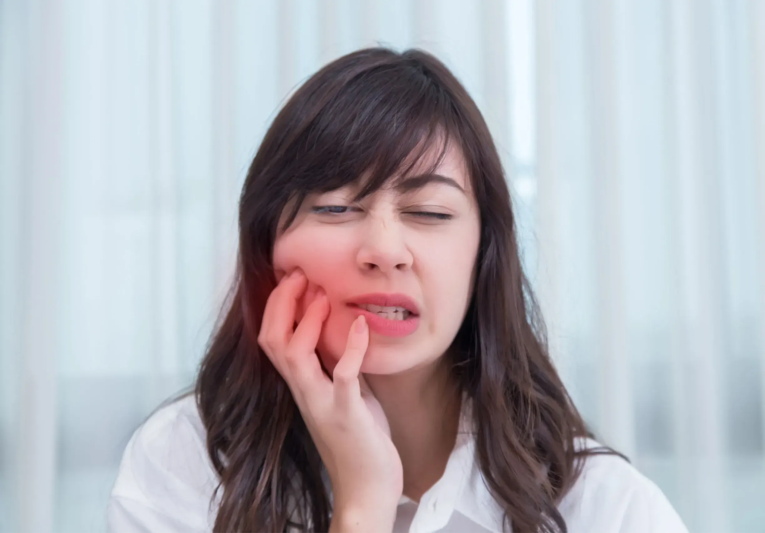 Close-up of patient describing tooth pain at East Ellijay Family & Cosmetic Dentistry